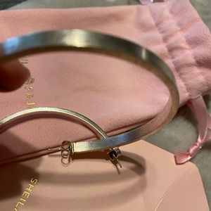 Shelia Fajl brushed silver Lunaria large hoops. Used